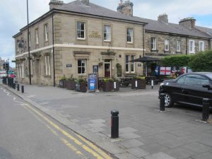 Picture of the County pub and the pavement entry to its car park and Roseworth Terrace.