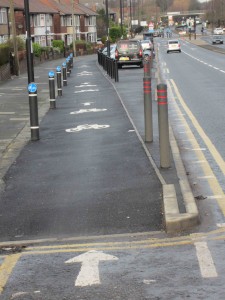 Separated by bollards and parking on the Great North Road