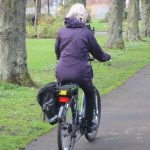 A rider on an electric bike in Gosforth Central Park