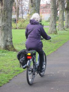 A rider and bicycle at the electric bike trial in Gosforth Central Park