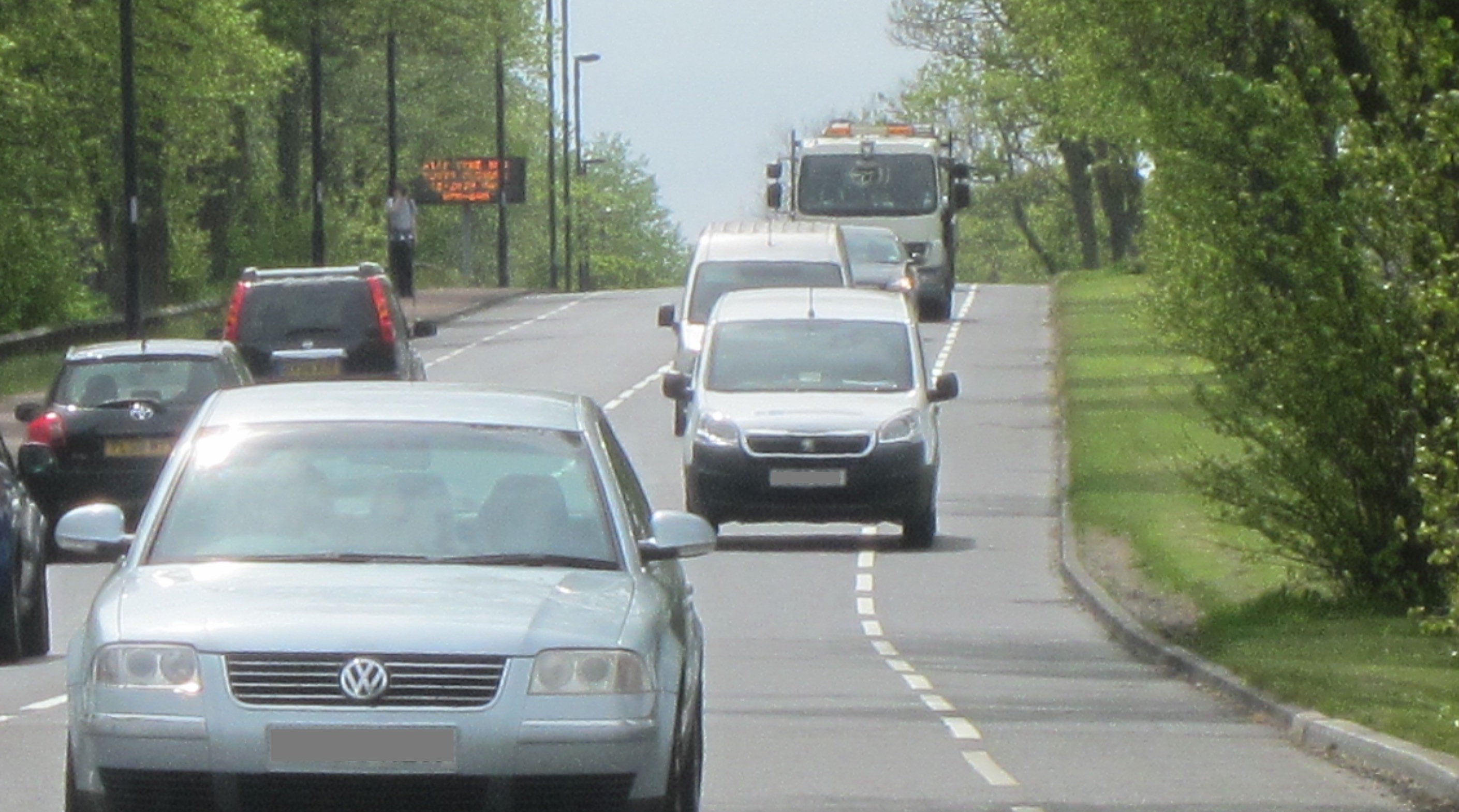 A second white van driving in the cycle lane on Grandstand Road