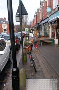 Picture of cluttered street furniture on the pavement at Brentwood shops.