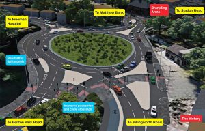 A giant roundabout plus traffic lights by Station Road / Hunters Road