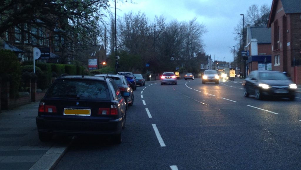 Picture of cars parked on the pavement / cycle lane on Gosforth High Street