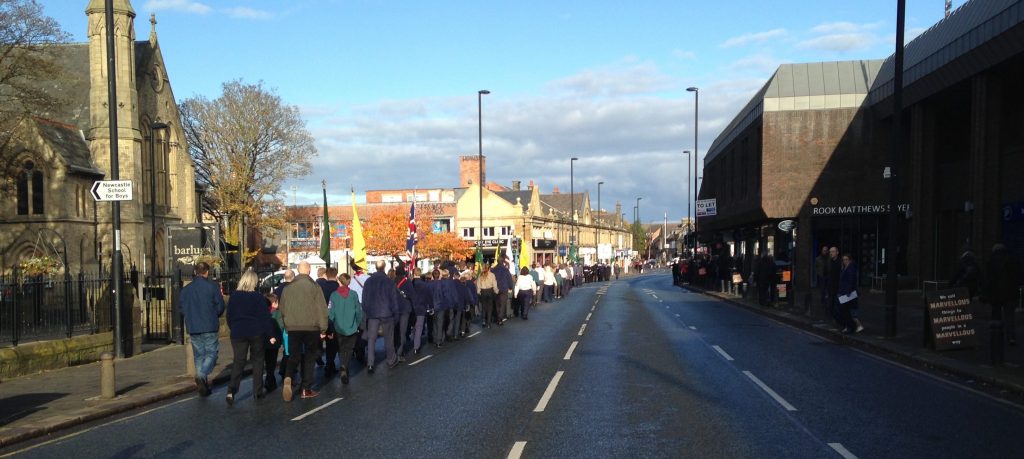 Picture of the Remembrance Sunday parade on Gosforth High Street returning to Woodbine Avenue.