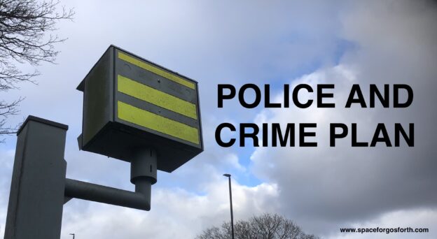 Picture of a speed camera with text, police and crime plan.